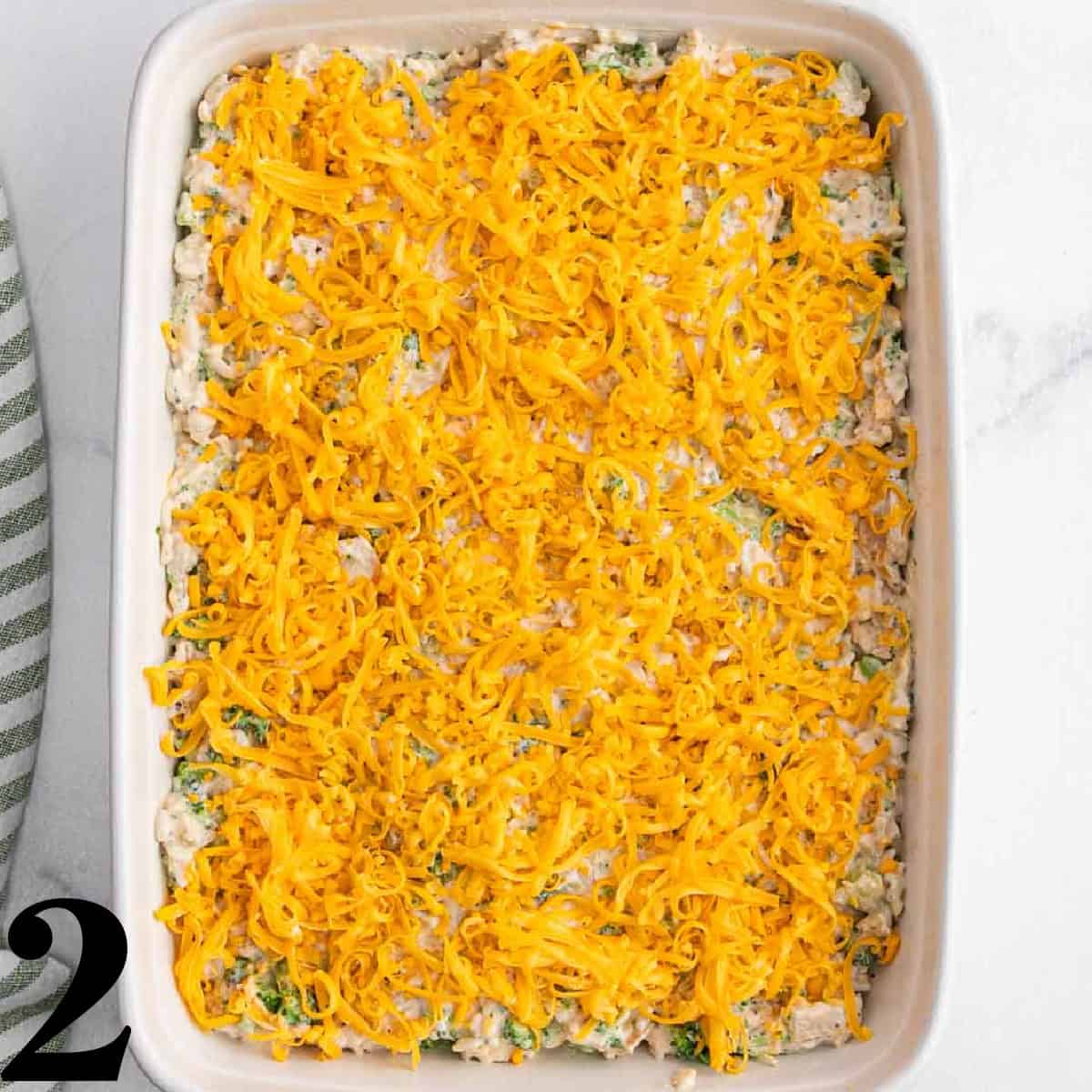 A white baking dish of chicken broccoli rice casse
