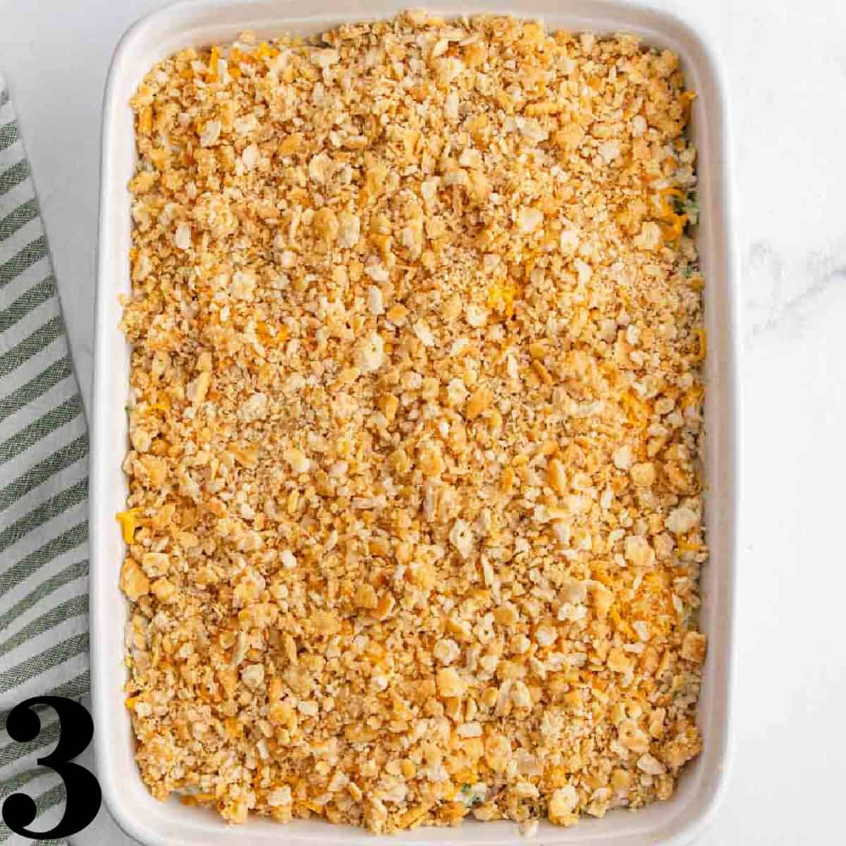 A white baking dish of chicken broccoli rice casse