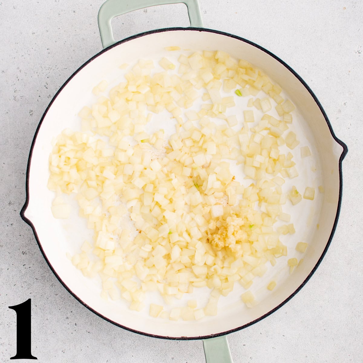 Diced onions in a skillet.