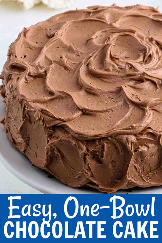 A round chocolate cake with chocolate frosting.