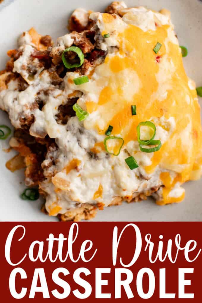 A white plate with a square piece of cowboy casserole on it with a fork.