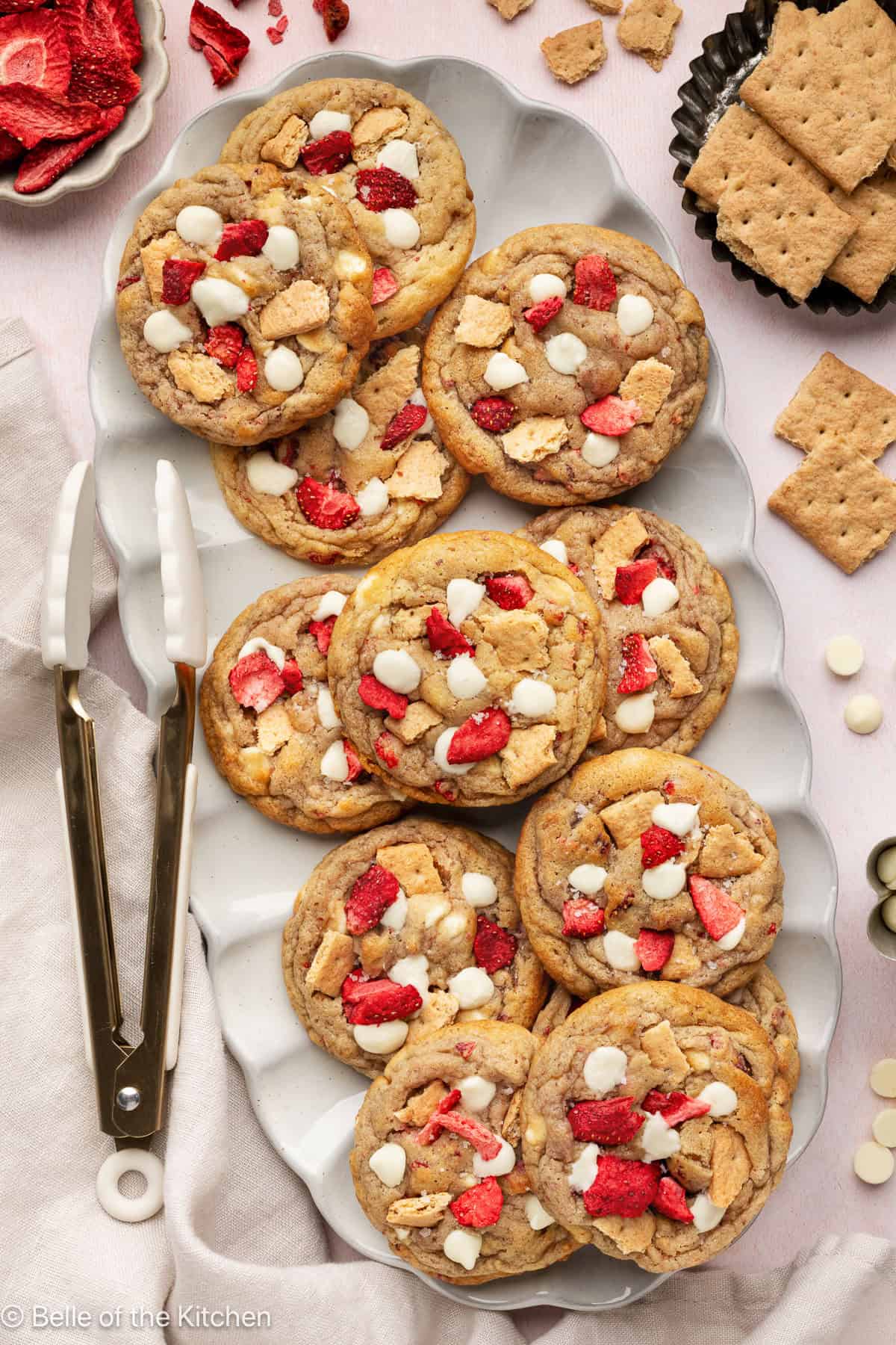 A platter full of strawberry cheesecake cookies.