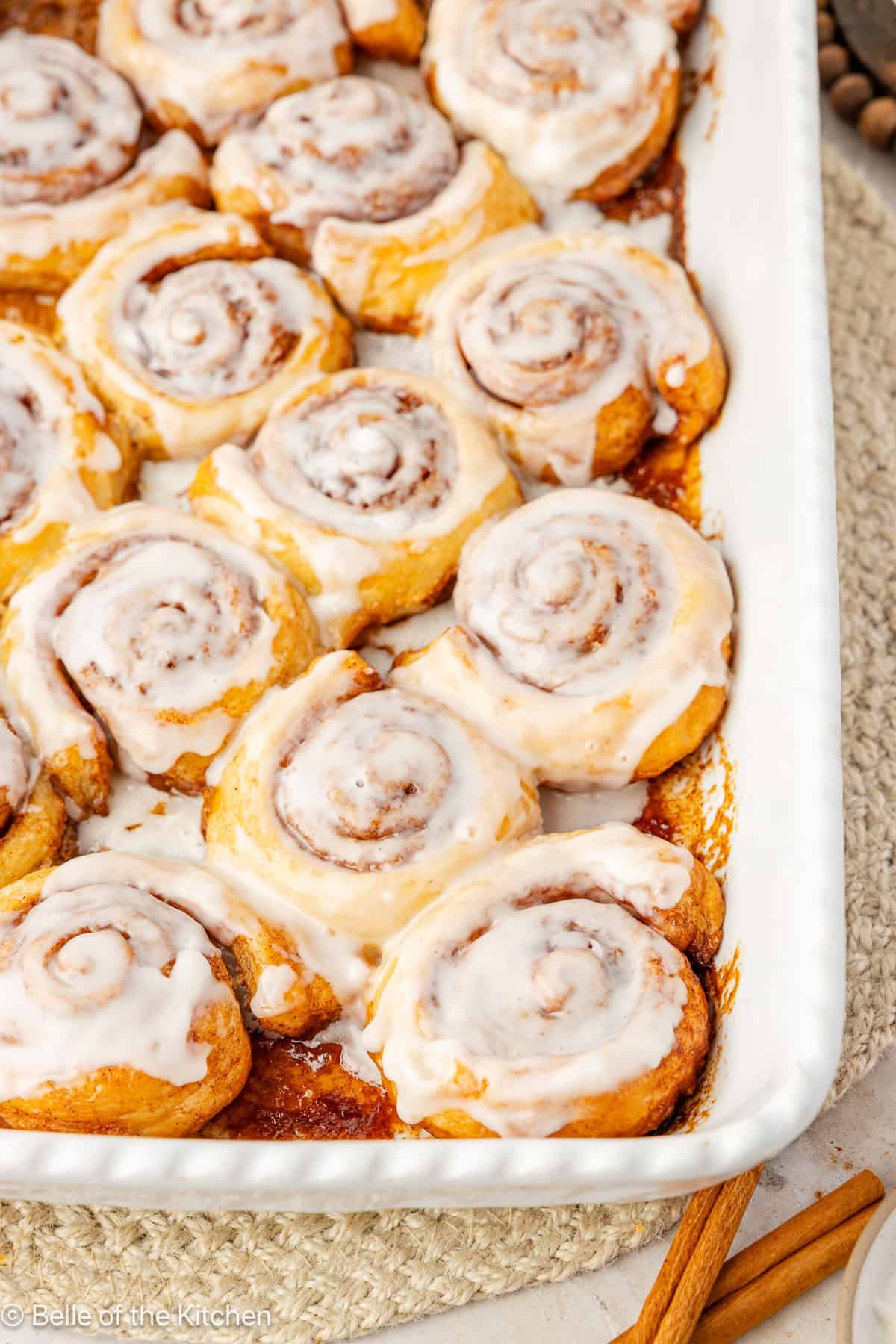 Cinnamon rolls in a baking dish.
