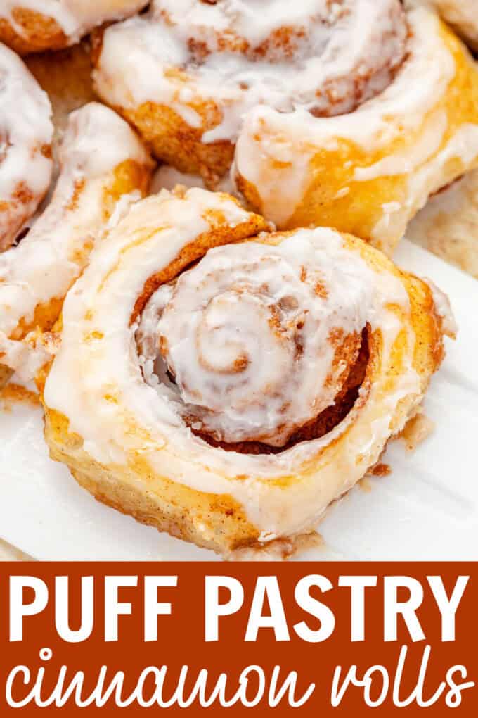 A cinnamon roll on a white plate.