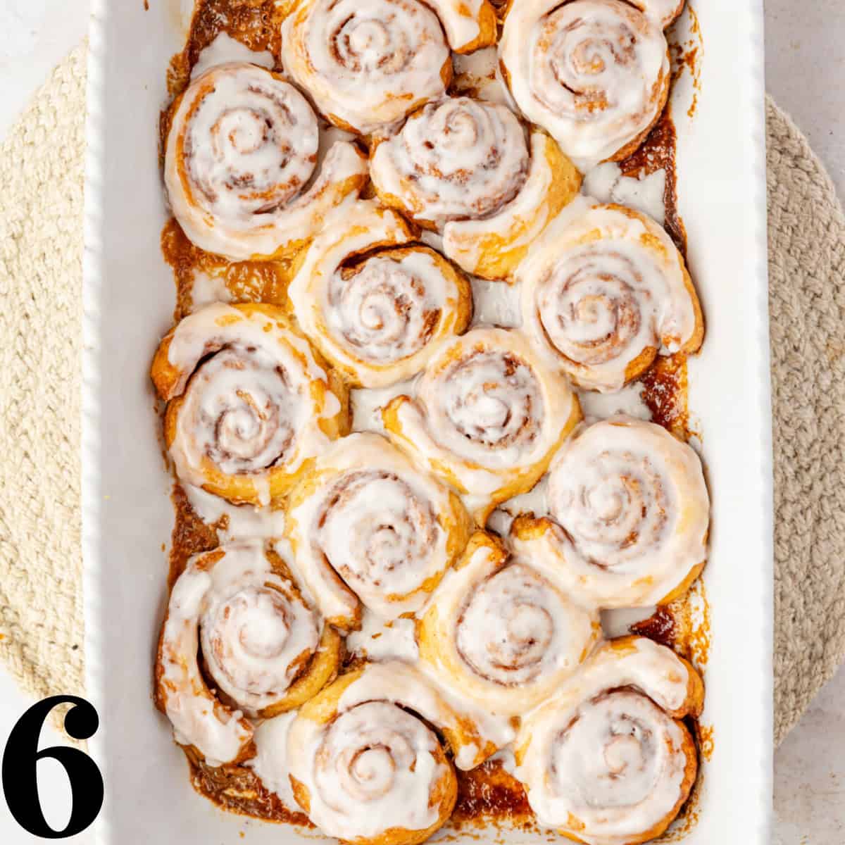 Cinnamon rolls in a baking dish.