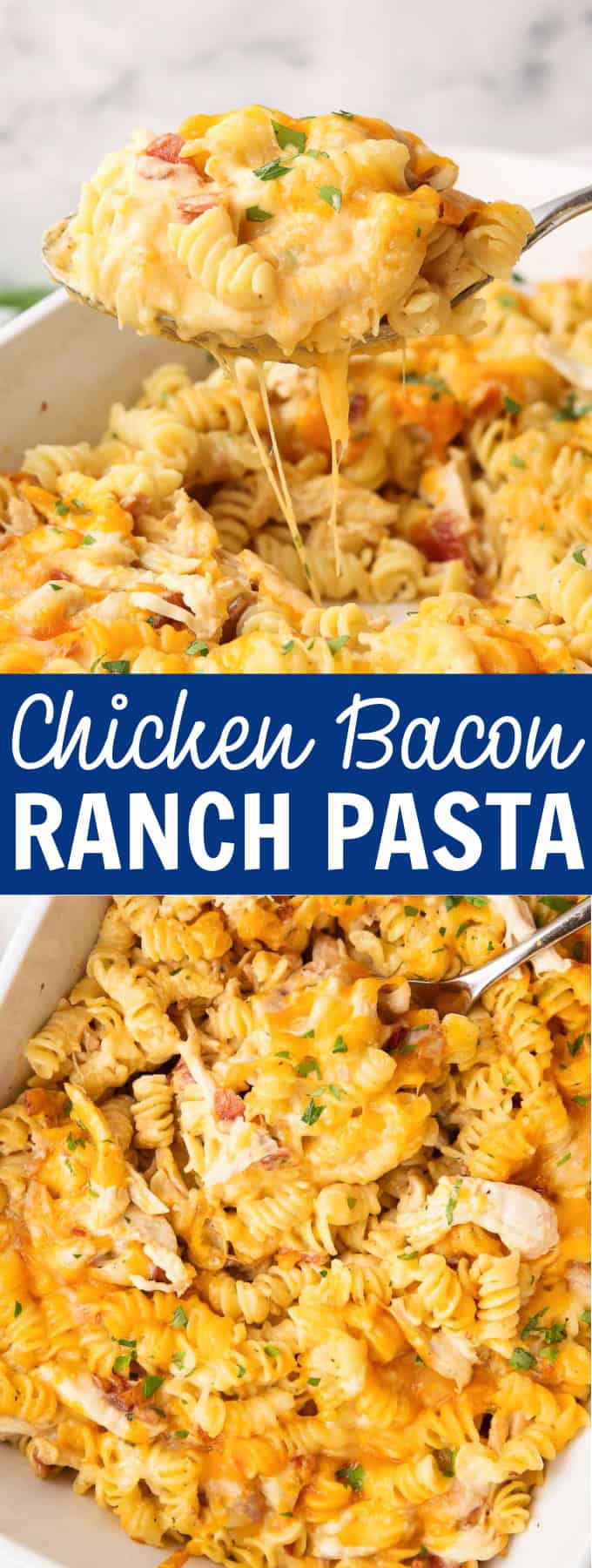 A spoon lifting food from a white baking dish full of pasta, chicken, bacon, and cheese.