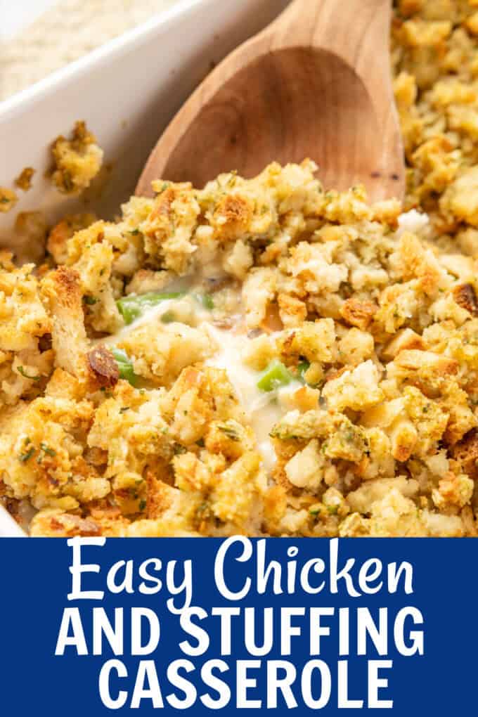 A wooden spoon scooping up chicken and stuffing casserole.